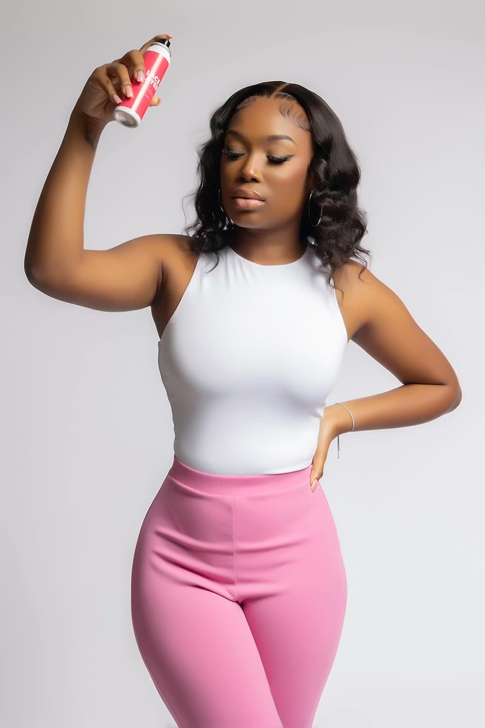 Black women using freeze melting spray