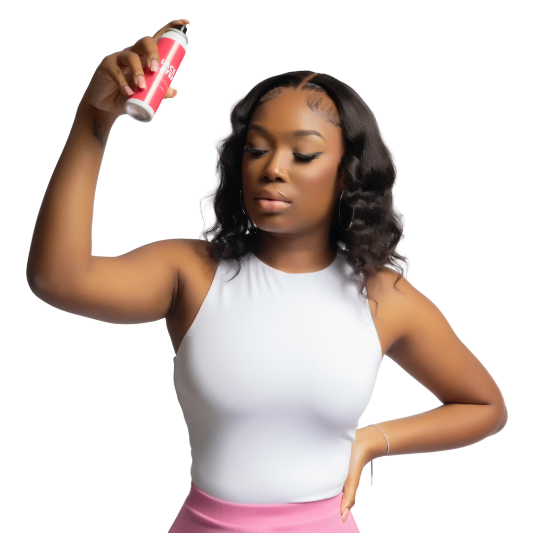 Women using our freeze melt glueless adhesive spray